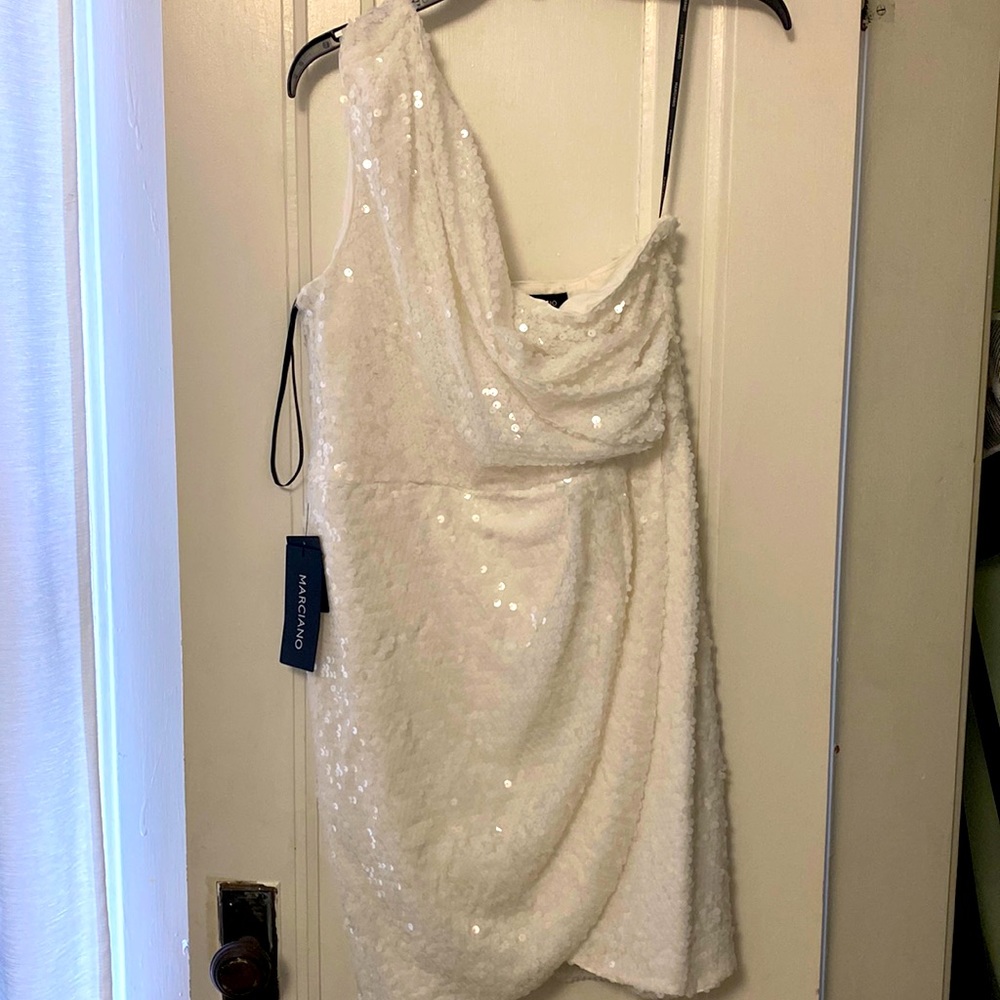 White sequins dress by Marciano. One-shoulder, zip back. Size large white dress.